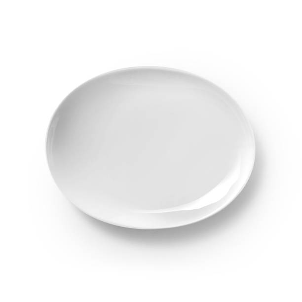 istock Top view of blue ceramic plate isolated on white background 1333532927
