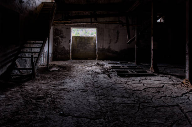 Old factory interior with broken pieces of machinery