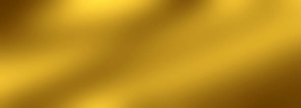 istock Golden blurred banner background with shadows and highlights 1333543591