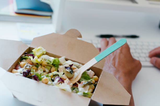 istock chickpea salad and man sitting at his desk 1333544699