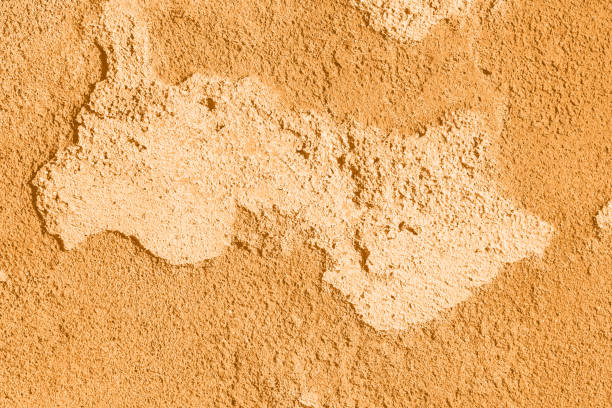 istock Concrete orange colorful wall surface texture. Abstract grunge bright marigold color background with aging effect. Copyspace. Trendy color of the year 2021. 1333546261