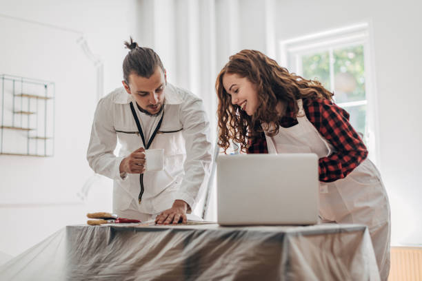 istock Couple choosing colors for new home 1333546609