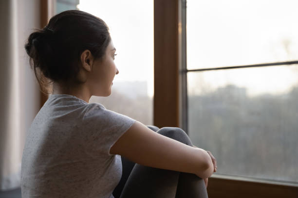 istock Dreamy Indian woman look in distance visualizing 1333547997
