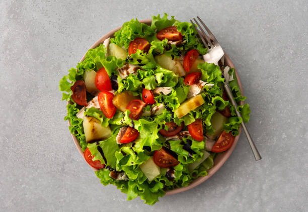 istock Tomato, pineapple and chicken breast salad 1333549072