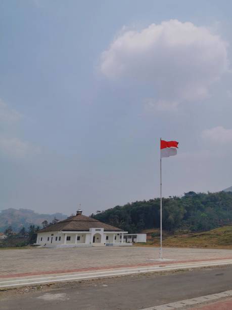 istock Indonesian flag in front of mosque 1333549074