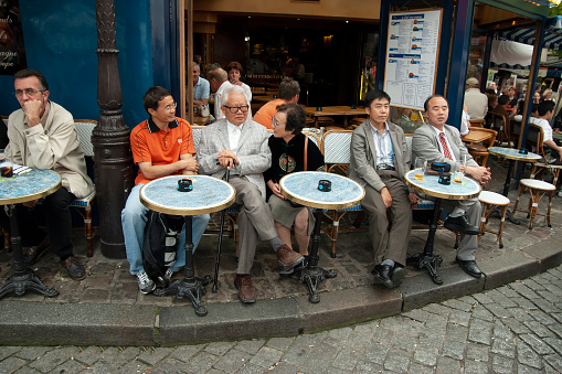paris france september 
 28 - 2006 unknown people sitting outside a restaurant in paris city at Place du Tertre -Montmartre square in paris.