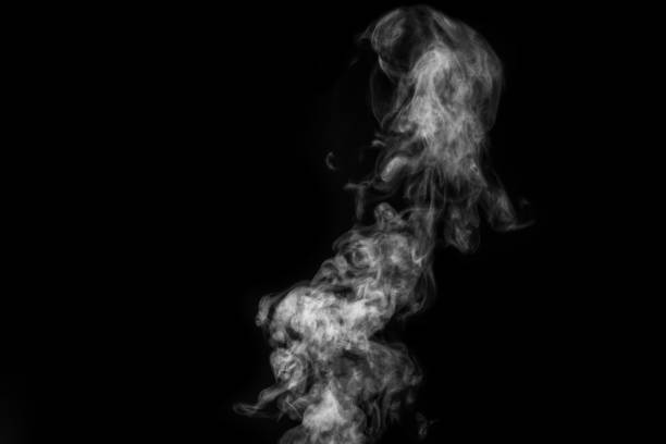 istock Perfect mystical curly white steam or smoke isolated on black background. Abstract background fog or smog 1333552720