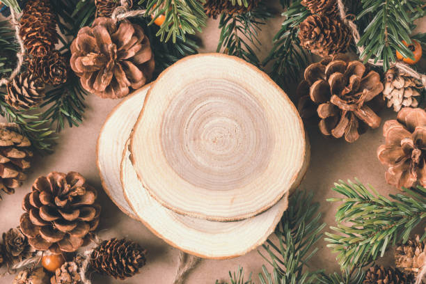 istock Christmas composition. Spruce branches, cones, wooden stands. Natural materials, eco decorations for the new year. Place for text 1333553046