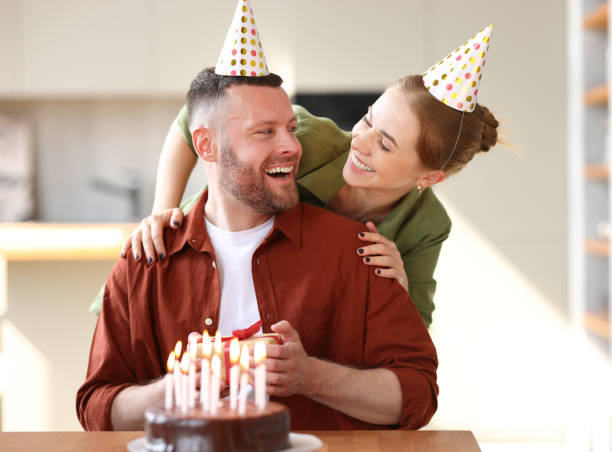 istock Loving wife making surprise for husband on Birthday 1333555952