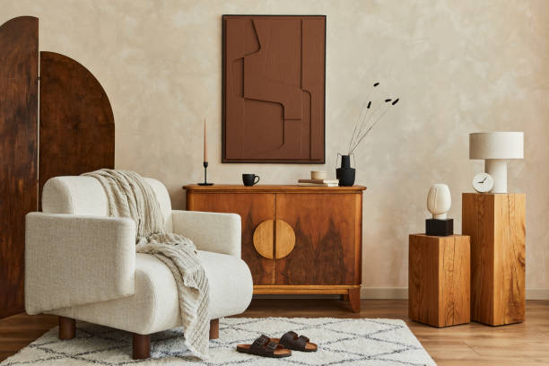 istock Stylish composition of modern living room interior with structure painting, folding screen, vintage commode, armchair, wooden cubes and accessories. Creative wall, carpet on the floor. Template. 1333558865