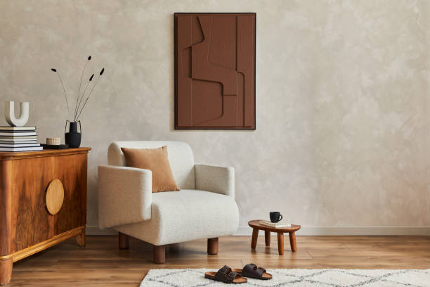 istock Stylish composition of modern living room interior with structure painting, folding screen, vintage commode, armchair, wooden cubes and accessories. Creative wall, carpet on the floor. Template. 1333558897
