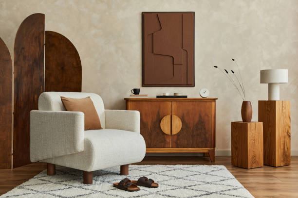istock Stylish composition of modern living room interior with structure painting, folding screen, vintage commode, armchair, wooden cubes and accessories. Creative wall, carpet on the floor. Template. 1333558925