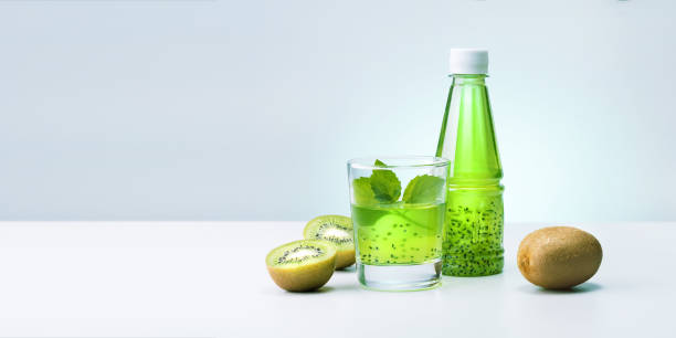 istock Green detox smoothie with kiwi. Banner with copy space. 1333558934