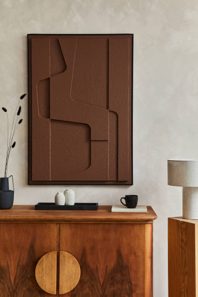 istock Stylish composition of modern living room interior with structure painting, folding screen, vintage commode, armchair, wooden cubes and accessories. Creative wall, carpet on the floor. Template. 1333558935