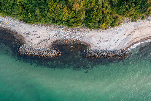 Villingebaek, Denmark - July 23, 2021: Aerial view of coastal protection in North Zealand