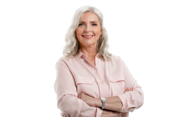 istock Attractive grey haired senior woman studio portrait 1333565759