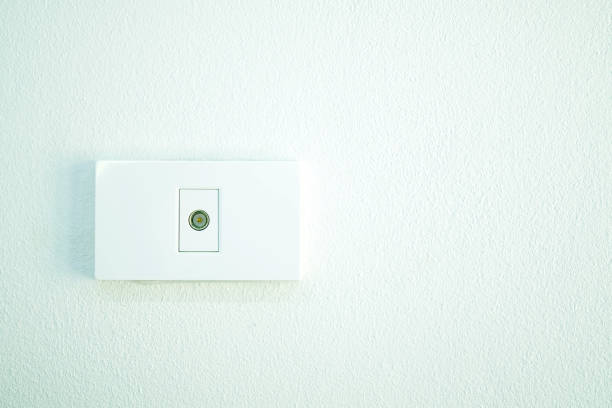 istock White Television contract connection point on white wall in house. 1333567230