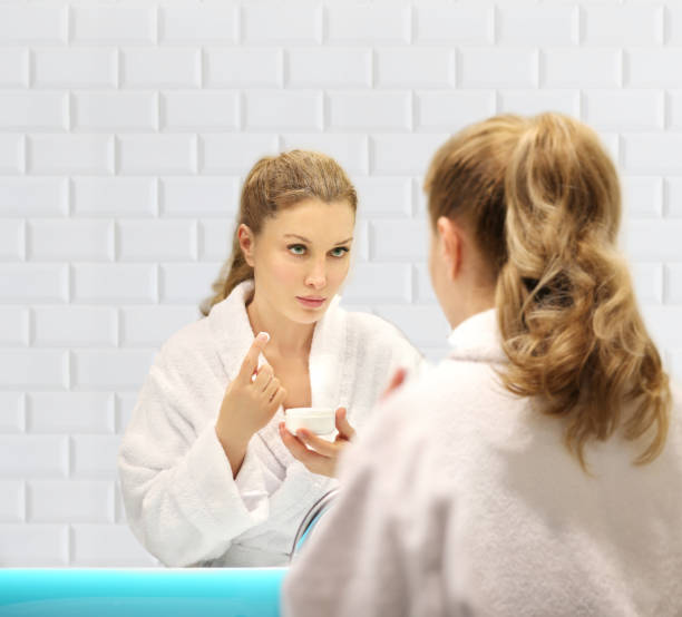 istock Magic anti-aging cream.Applying the cream 1333568042