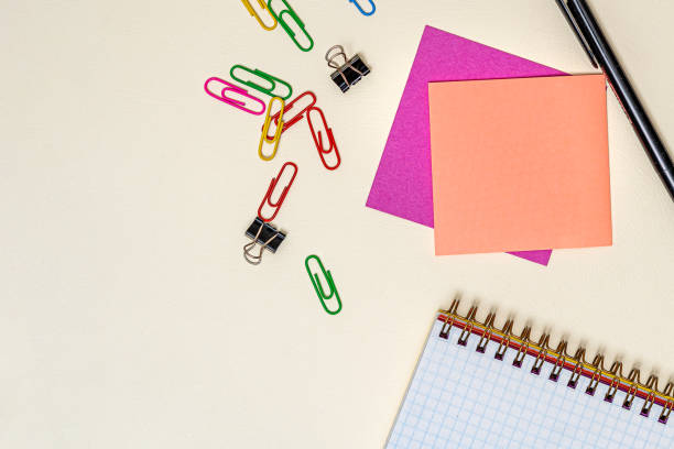istock Multiple Assorted Collection Office Stationery Photo With Pens Pencils Notepads Notebook Ruler Stapler Scissors Clippers Paper Clips Holders Clipboard Placed Over Table 1333569970