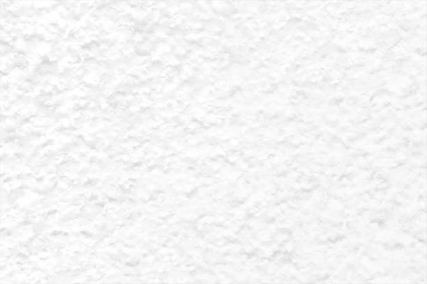 horizontale vektorhintergründe mit einer wand wie gepunktete raue, ungleichmäßig körnige textur in weißer farbe gemalt - backgrounds concrete wall outdoors architecture stock-grafiken, -clipart, -cartoons und -symbole