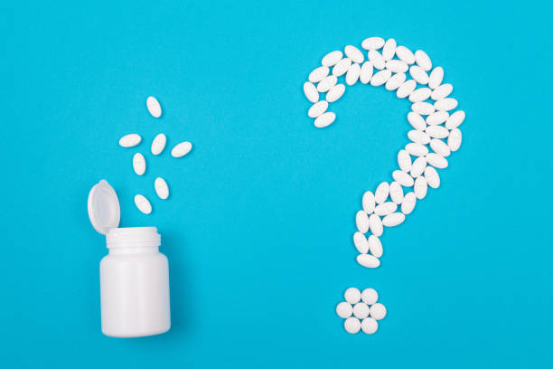 istock White Question Mark. Pharmaceutical Industry and Medicinal Products 1333571979