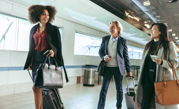 istock Travelling people at airport terminal 1333574642