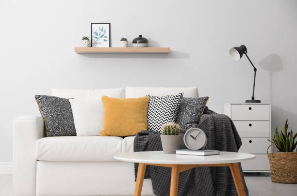 istock Elegant white sofa in modern living room interior 1333575172