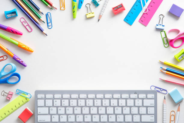 istock School supples and keyboard on white background. Flat lay, top view colorful stationery. E-learning, online school concept. 1333575272