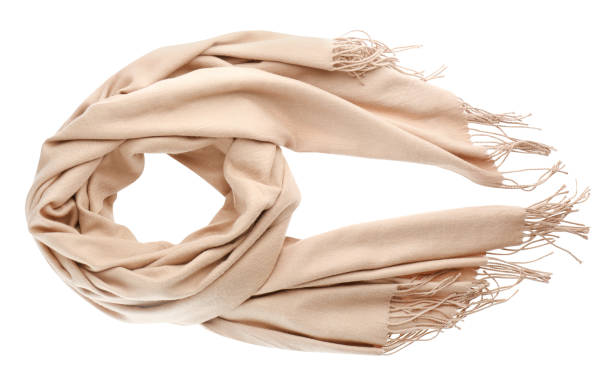 Soft beige scarf isolated white, top view Soft beige scarf isolated white, top view scarf stock pictures, royalty-free photos & images