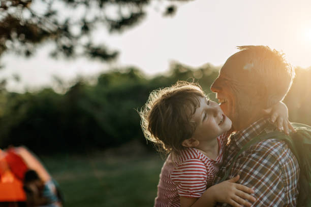 istock Grandfather playing with granddaughter 1333587094
