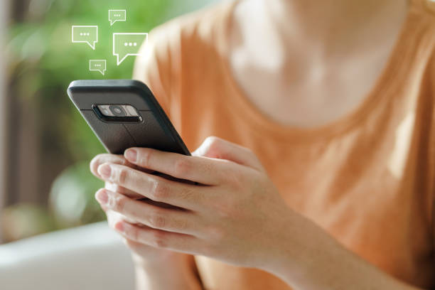 istock Young Asian woman using smartphone typing, chatting conversation . Social Network, technology concept 1333587829