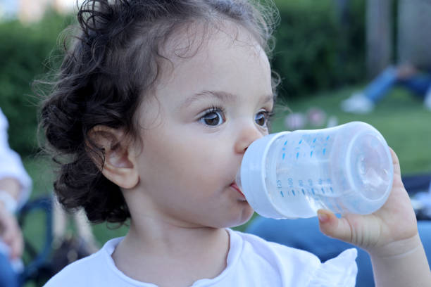 Baby Girl With Bottle