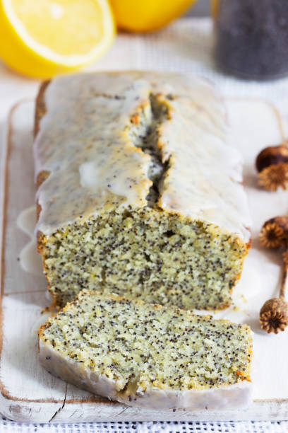 istock Lemon cake with poppy seeds, covered with glaze on a light background. 1333592466
