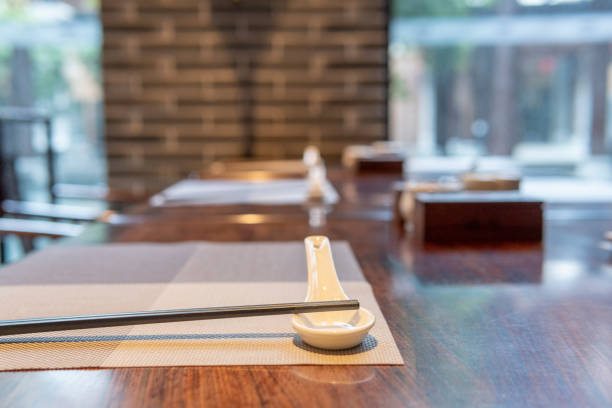 istock Chinese traditional dining tables, chairs and tableware in the restaurant 1333593853