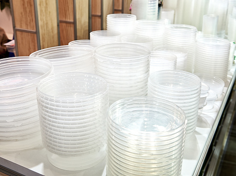 Plastic plates and containers in a store at an exhibition