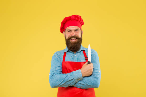 istock Chef using ceramic knife for cutting fruits and vegetables, professional utensils 1333598337