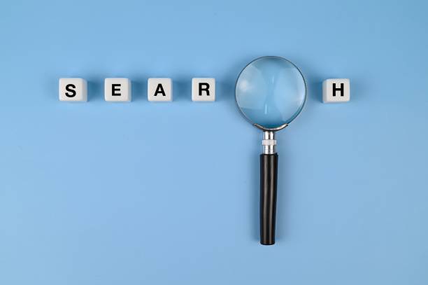 istock A magnifying glass with letter spelling SEARCH 1333598346