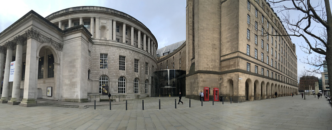 Manchester Central Library( on the left) in Greco Roman style, and to the right, the administration and civic offices.These imposing buildings lie in St Peters square in the heart of the city.Manchester Town Hall, a magnificent victorian building can be found in Albert Square behind the Civic offices.