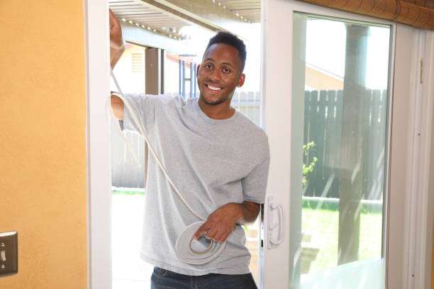 istock Weather Stripping African American Man Looks at Camera 1333605884