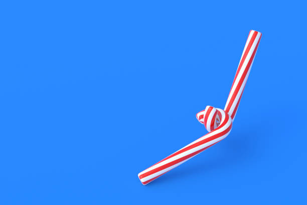 istock Christmas canes, candy with red stripes on blue background. New Years celebration concept. Traditional sweet dessert. Copy space. 3d render 1333610454
