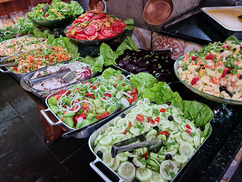 Self-service salad buffet with a variety of products