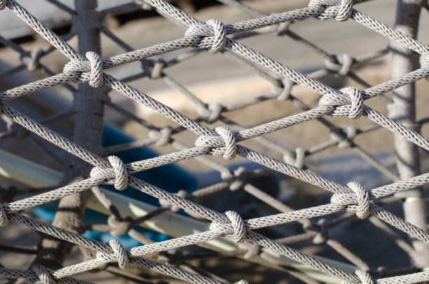 istock Marine rope. Knot. Rope mesh. Barrier. 1333614776