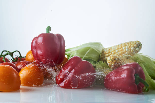 Bell peppers on wooden board
