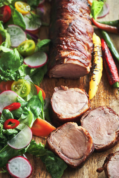 istock Pork Fillet with Bacon and Healthy Salad 1333621593
