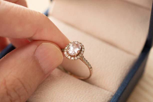 istock hand hold beautiful jewelry diamond ring 1333654248