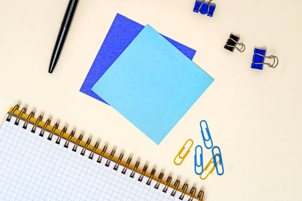 istock Multiple Assorted Collection Office Stationery Photo With Pens Pencils Notepads Notebook Ruler Stapler Scissors Clippers Paper Clips Holders Clipboard Placed Over Table 1333654797