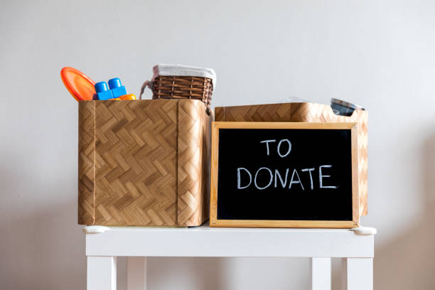 istock Boxes of things for a donation. Decluttering, cleaning and moderate consumption for a sustainable life 1333666240