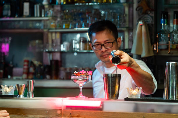 istock Caucasian man sitting at bar counter enjoy drinking alcoholic drink 1333666357