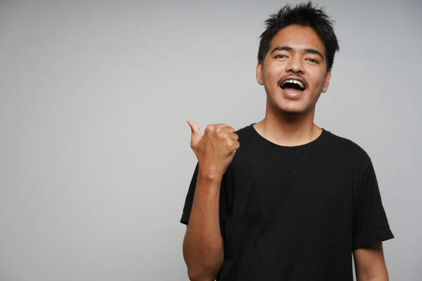 istock Indonesian/Asian Man wearing black shirt 1333676326