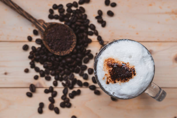 istock Top view selective focus of iced coffee froth in coffee mug. 1333678232